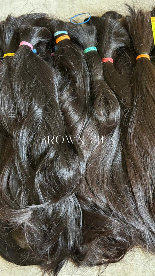 Raw Filipino natural straight human hair with cuticle-aligned ponytails, ethically sourced and unprocessed